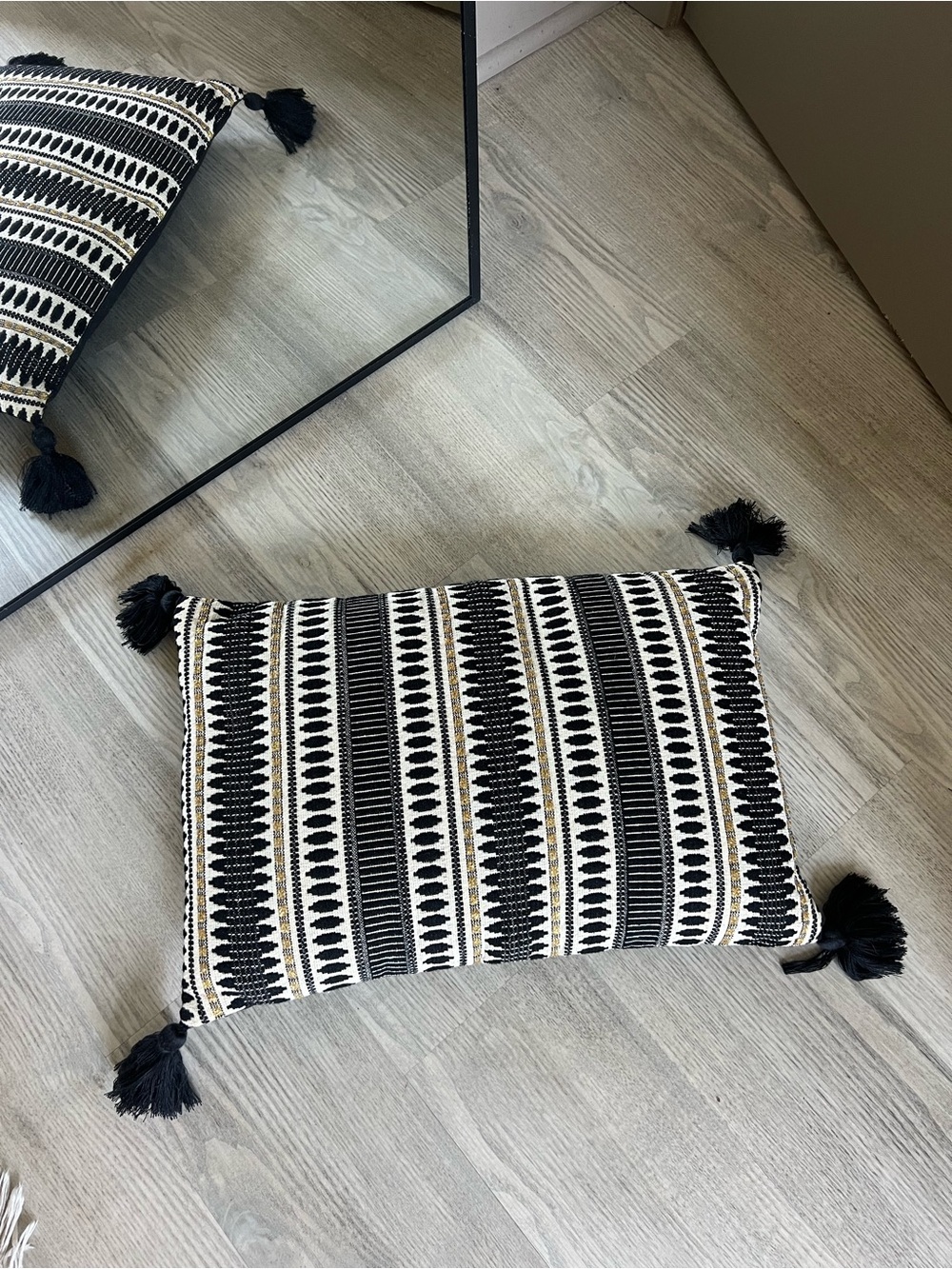 Black and White Patterned Decorative Throw Pillow with Tassels